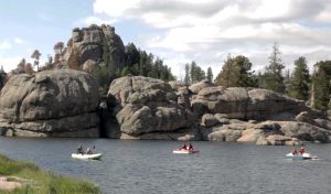 kayakers and paddle-boaters on Sylvan Lake